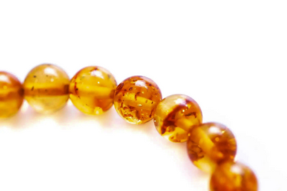 Orange Amber Sphere Bead Bracelet